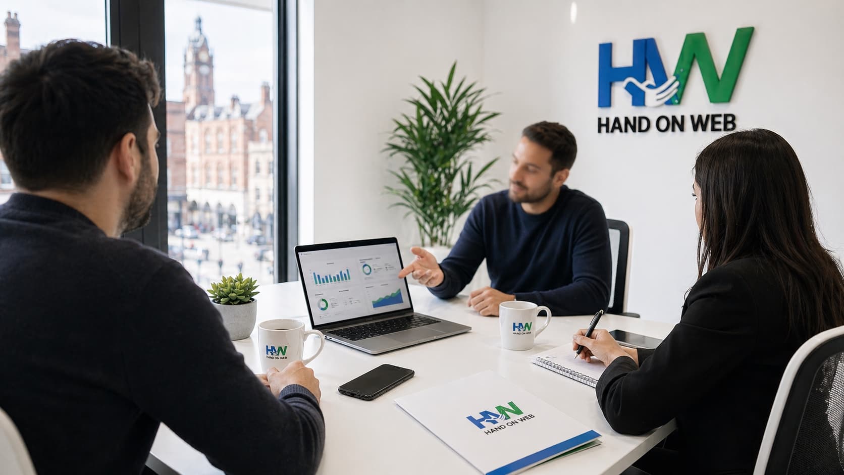 Client meeting at Hand On Web's Chester office